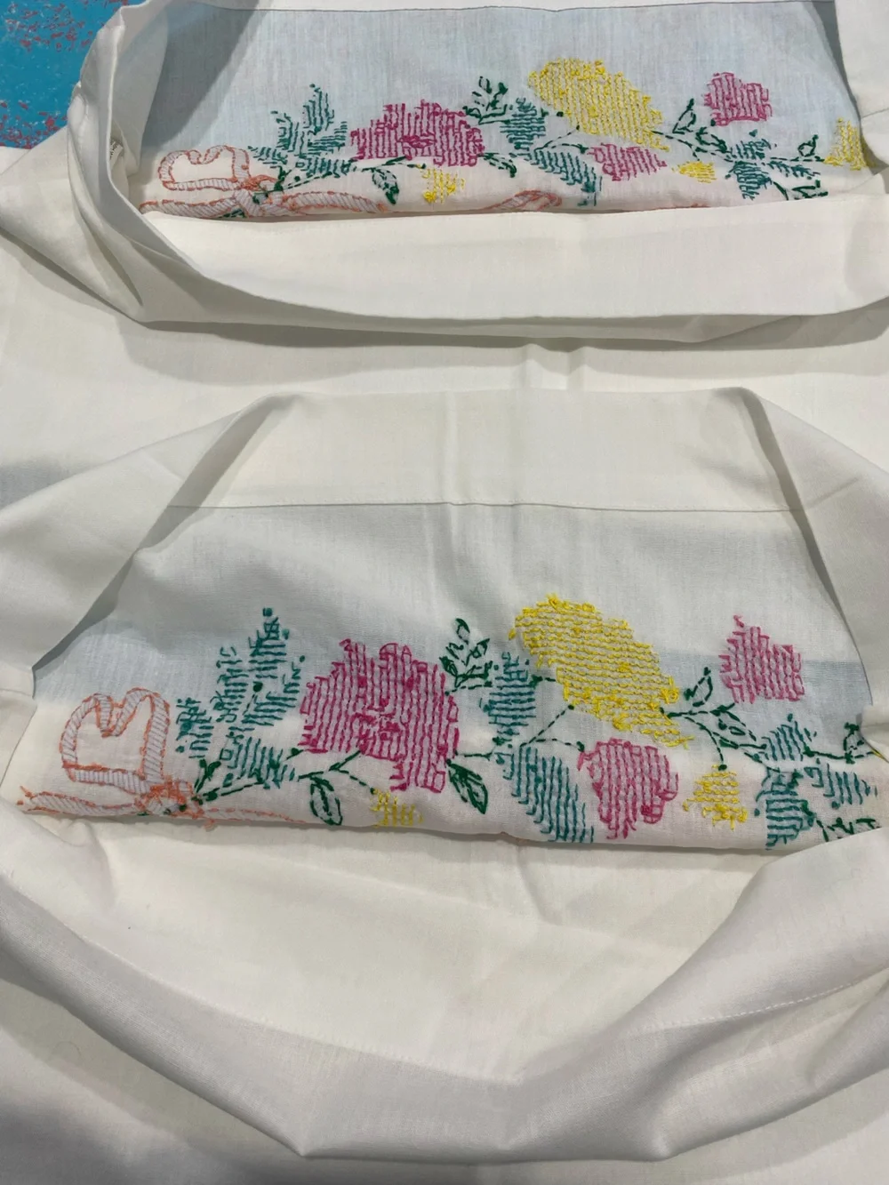 2 Hand Embroidered Floral Pillowcase Set in White with Pink & Yellow Accents